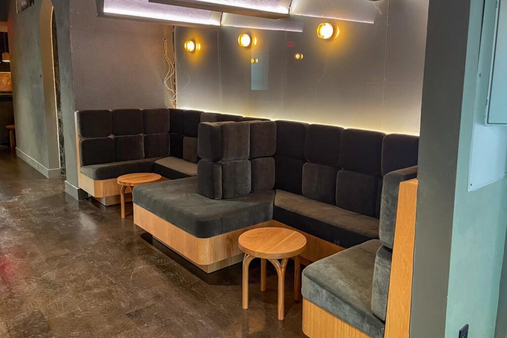Sixth-Ave-green-banquette-seating
