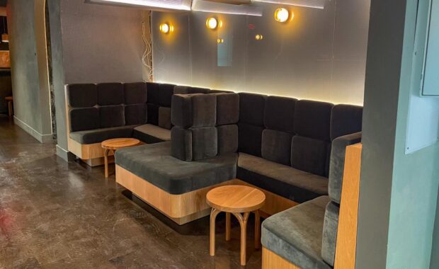 Sixth-Ave-green-banquette-seating
