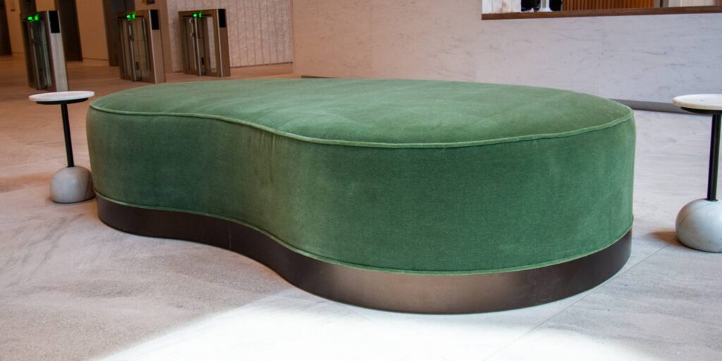 Sixth-Ave-green-custom-millwork-banquette-in-lobby