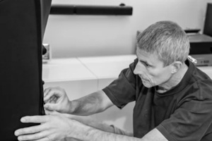 man assembling new furniture at home