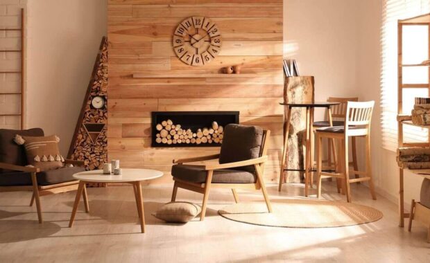 decorative fireplace with stacked wood in cozy living room interior - commercial millwork design