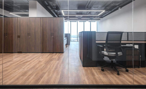 open office space featuring wooden accents and modern commercial millwork design furniture