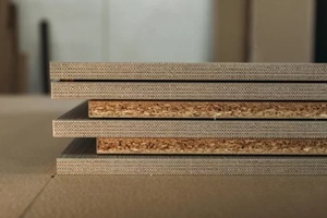 stacked plywood panels ready for furniture production