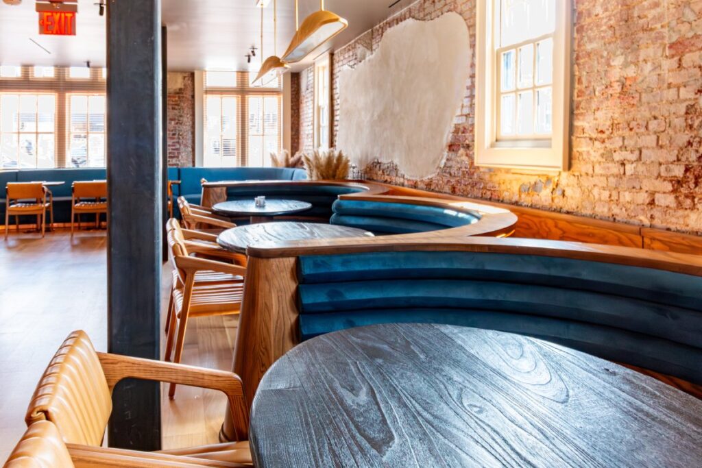 Curved blue banquette seating in Florer&iacute;a, Washington, DC.