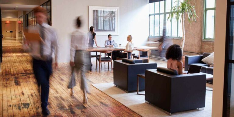 business-people-at-work-in-a-busy-luxury-office-space-768x384