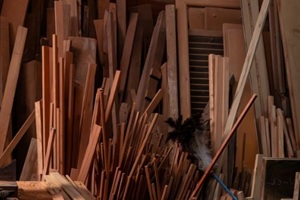 collection of wooden planks and panels in an Argentine workshop during the day
