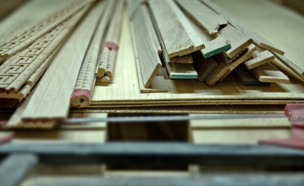 woodworking tools and wooden planks on a workbench