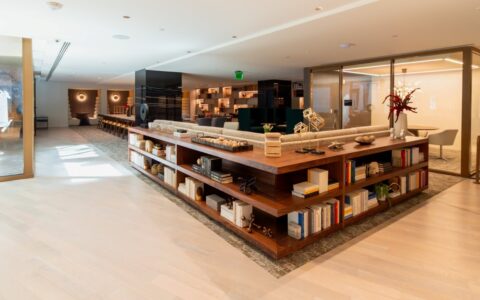 This comprehensive wide shot of the 1425 NY Ave project serves as the perfect "anchor" for the series, revealing how the various work and social zones are interconnected through clever architectural millwork.